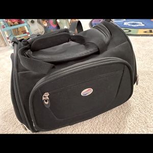 American Tourister black carry on